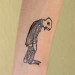 Seamus's tattoo.  Looks like him first thing in the morning.